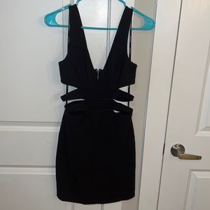Bebe Addiction label black cutout dress size small